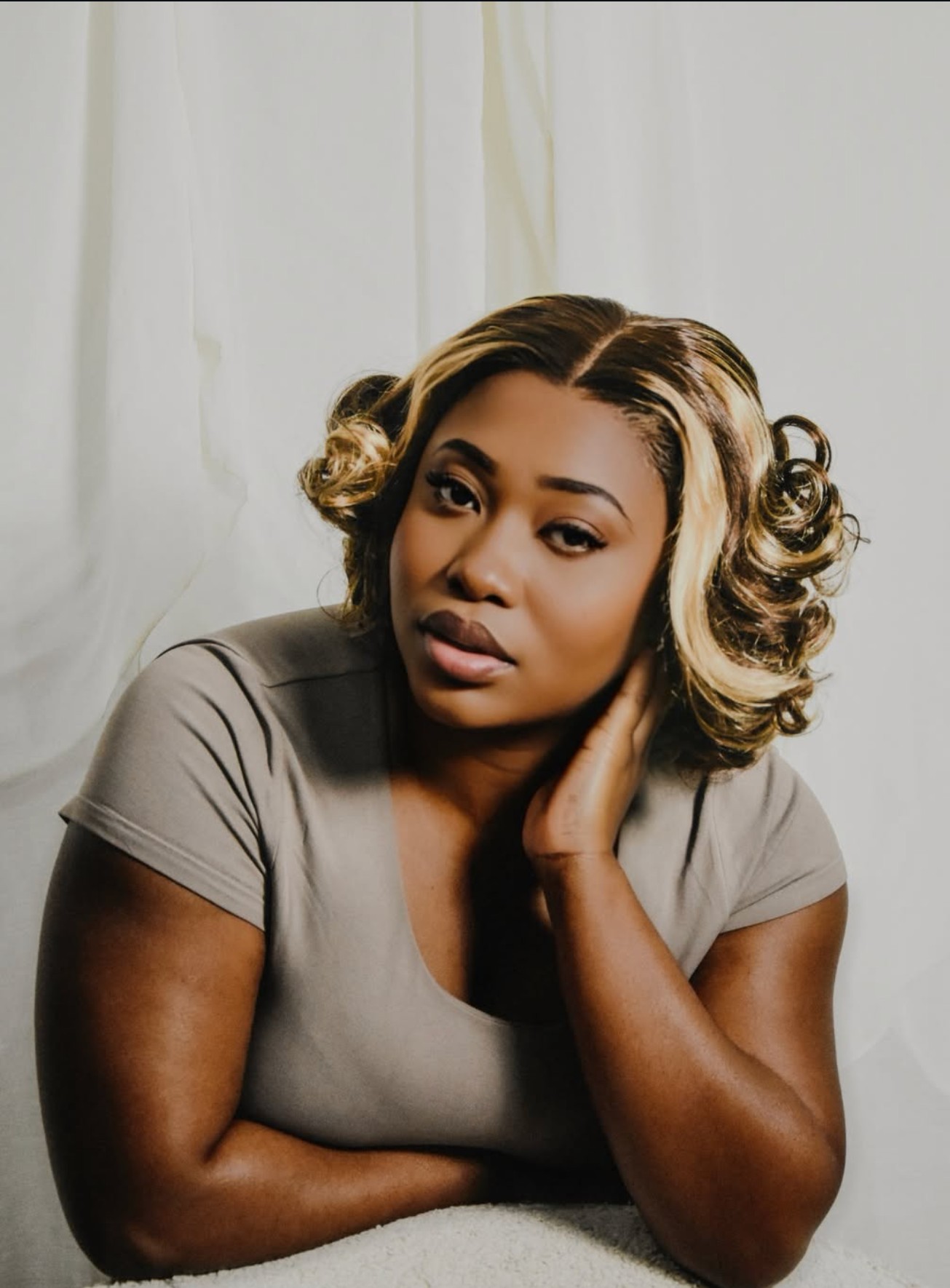 Crowned by Grace founder showcasing luxury hair artistry